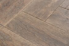 Distressed light grey engineered oak wood flooring country grade 190mm wide with splits and character finished with natural oil in Surrey