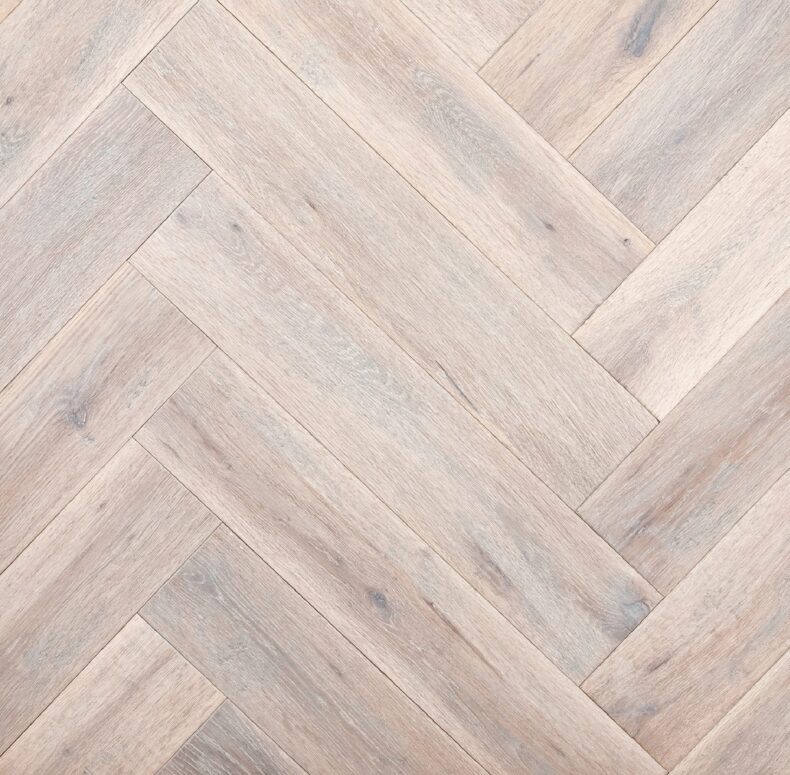 Distressed light grey engineered oak wood flooring country grade 190mm wide with splits and character finished with natural oil in Surrey
