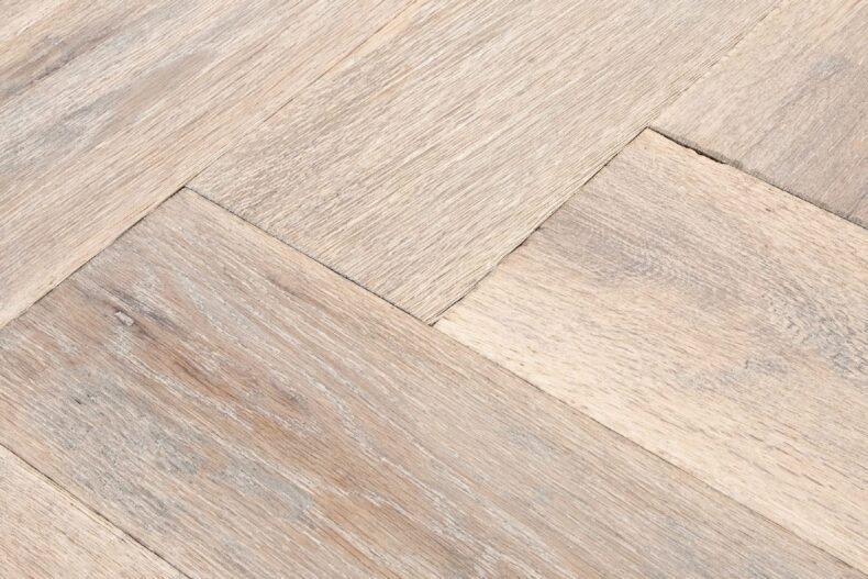 Distressed light grey engineered oak wood flooring country grade 190mm wide with splits and character finished with natural oil in Surrey