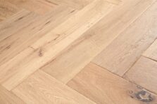 Distressed light grey engineered oak wood flooring country grade 190mm wide with splits and character finished with natural oil in Surrey