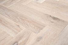 Distressed light grey engineered oak wood flooring country grade 190mm wide with splits and character finished with natural oil in Surrey