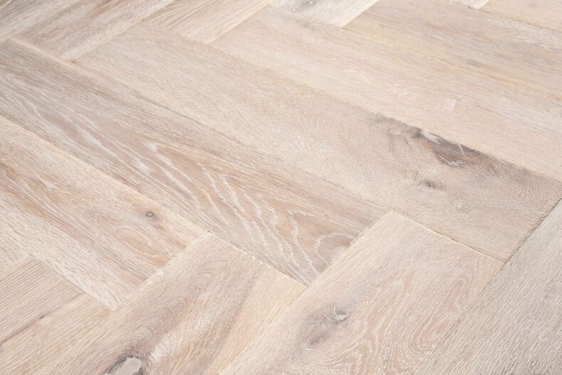 Distressed light grey engineered oak wood flooring country grade 190mm wide with splits and character finished with natural oil in Surrey