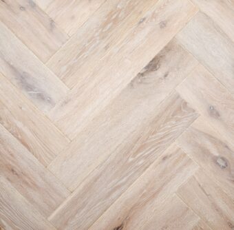 Distressed light grey engineered oak wood flooring country grade 190mm wide with splits and character finished with natural oil in Surrey