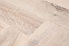 Distressed light grey engineered oak wood flooring country grade 190mm wide with splits and character finished with natural oil in Surrey
