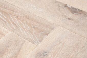 Distressed light grey engineered oak wood flooring country grade 190mm wide with splits and character finished with natural oil in Surrey