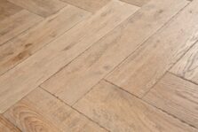 Distressed light grey engineered oak wood flooring country grade 190mm wide with splits and character finished with natural oil in Surrey