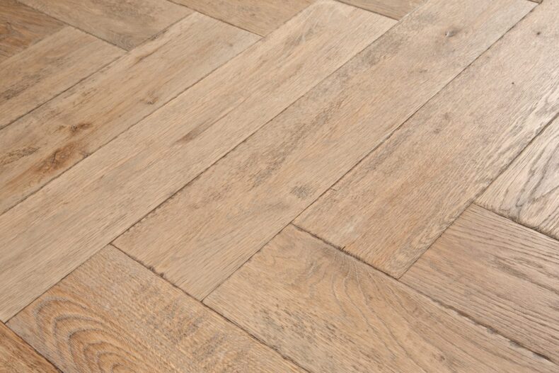 Distressed light grey engineered oak wood flooring country grade 190mm wide with splits and character finished with natural oil in Surrey