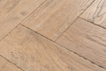 Distressed light grey engineered oak wood flooring country grade 190mm wide with splits and character finished with natural oil in Surrey