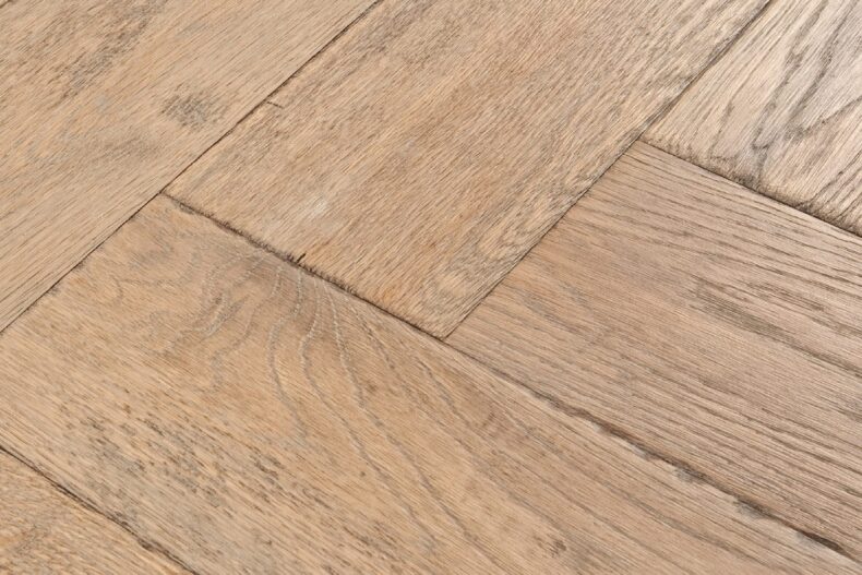 Distressed light grey engineered oak wood flooring country grade 190mm wide with splits and character finished with natural oil in Surrey