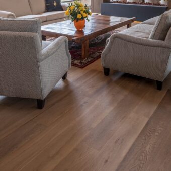 Light brown engineered wood flooring oak classic grade 190mm wide with brushed surface finished with natural oil in Surrey
