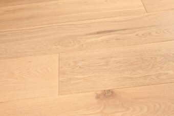 Light brown grey engineered wood flooring oak select grade 190mm wide with brushed surface finished with natural oil in Surrey