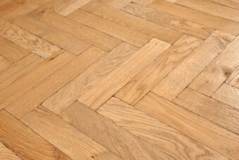 Light grey engineered oak wood flooring rustic grade 190mm wide lightly brushed finished with natural oil in Surrey