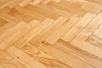 Light grey engineered oak wood flooring rustic grade 190mm wide lightly brushed finished with natural oil in Surrey