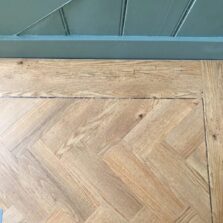 View of Sussex Oak - Parquet luxury vinyl tile by Harvey Maria