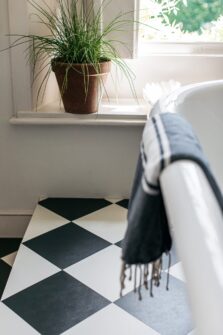 View of Squares Stove Black luxury vinyl tile by Harvey Maria