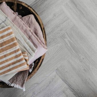 View of Earl Grey - Herringbone luxury vinyl tile by Harvey Maria
