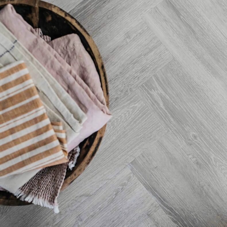 View of Earl Grey - Herringbone luxury vinyl tile by Harvey Maria