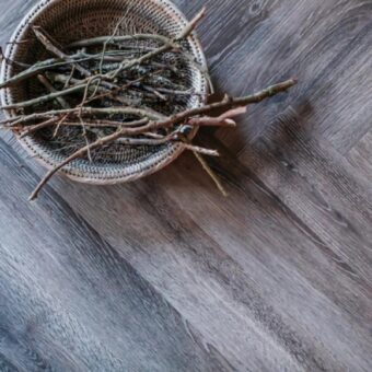 View of Garden Oak - Herringbone luxury vinyl tile by Harvey Maria