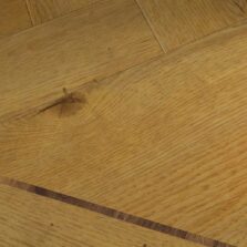 View of Sussex Oak - Parquet luxury vinyl tile by Harvey Maria