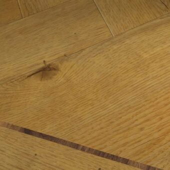 View of Sussex Oak - Parquet luxury vinyl tile by Harvey Maria