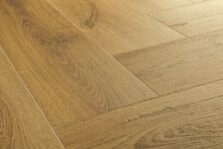 View of Botanic Smoked Oak AVHBU40363 luxury vinyl tile by Quick-Step Livyn