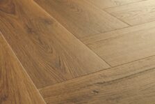 View of Botanic Caramel Oak AVHBU40364 luxury vinyl tile by Quick-Step Livyn