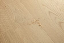 View of Coast Oak Beige AVSPU40321 luxury vinyl tile by Quick-Step Livyn