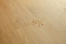 View of Coast Oak Honey AVSPT40320 luxury vinyl tile by Quick-Step Livyn