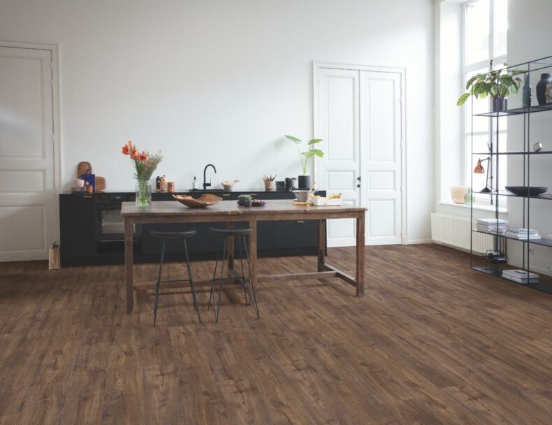 View of Autumn Oak Chocolate AVMPU40199 luxury vinyl tile by Quick-Step Livyn