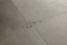 View of Cloudy Concrete AVMTU40273 luxury vinyl tile by Quick-Step Livyn