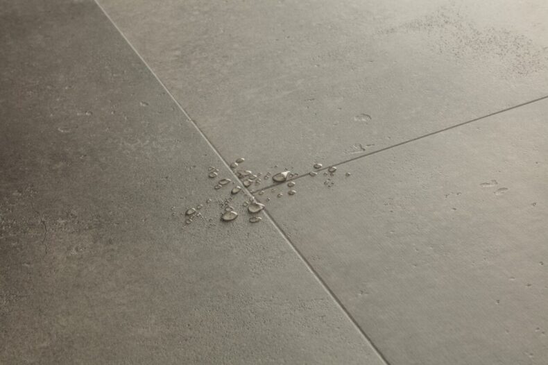 View of Cloudy Concrete AVMTU40273 luxury vinyl tile by Quick-Step Livyn
