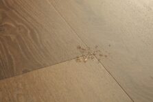 View of Elegant Oak Fumed AVMPU40317 luxury vinyl tile by Quick-Step Livyn