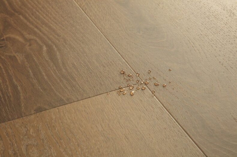 View of Elegant Oak Fumed AVMPU40317 luxury vinyl tile by Quick-Step Livyn