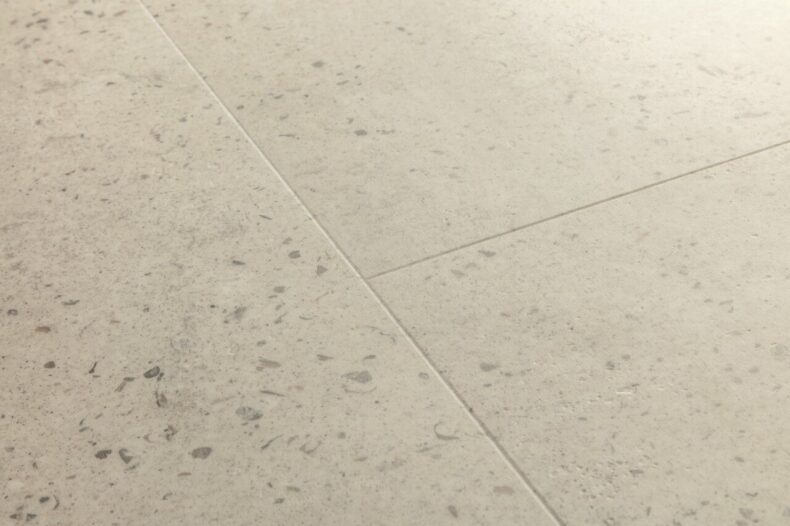 View of Oyster Concrete AVMTU40275 luxury vinyl tile by Quick-Step Livyn