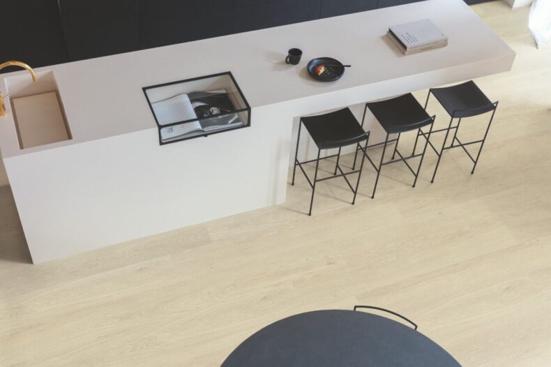 View of Sea Breeze Oak Beige AVMPU40080 luxury vinyl tile by Quick-Step Livyn