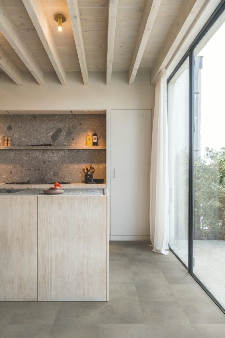 View of Concrete Rock AVSTT40234 luxury vinyl tile by Quick-Step Livyn