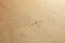 View of Elegant Oak Natural AVMPU40316 luxury vinyl tile by Quick-Step Livyn