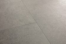View of Concrete Rock AVSTT40234 luxury vinyl tile by Quick-Step Livyn