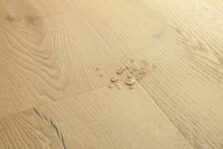 View of Brushed Oak Beige AVMPU40319 luxury vinyl tile by Quick-Step Livyn