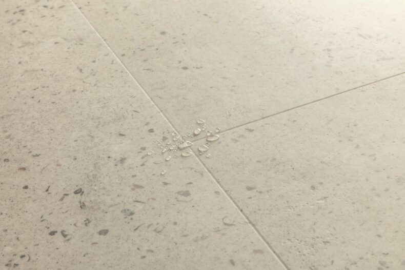 View of Oyster Concrete AVMTU40275 luxury vinyl tile by Quick-Step Livyn