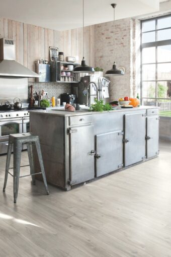 View of Canyon Oak Grey AVSPU40030 luxury vinyl tile by Quick-Step Livyn