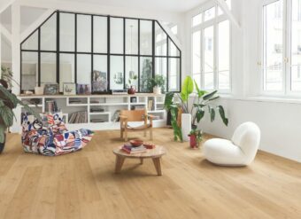View of Elegant Oak Natural AVMPU40316 luxury vinyl tile by Quick-Step Livyn