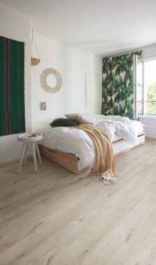 View of Cotton Oak White Blush AVMPU40200 luxury vinyl tile by Quick-Step Livyn