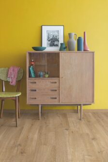 View of Cotton Oak Natural AVMPU40104 luxury vinyl tile by Quick-Step Livyn