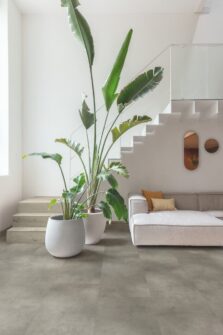 View of Cloudy Concrete AVMTU40273 luxury vinyl tile by Quick-Step Livyn