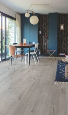 View of Cotton Oak Cozy Grey AVMPU40202 luxury vinyl tile by Quick-Step Livyn