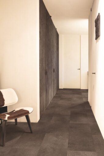 View of Cinnamon Rock AVSTU40233 luxury vinyl tile by Quick-Step Livyn