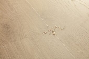 View of Coast Oak Sand AVSPT40322 luxury vinyl tile by Quick-Step Livyn