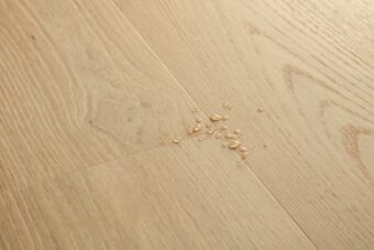 View of Coast Oak Beige AVSPT40321 luxury vinyl tile by Quick-Step Livyn