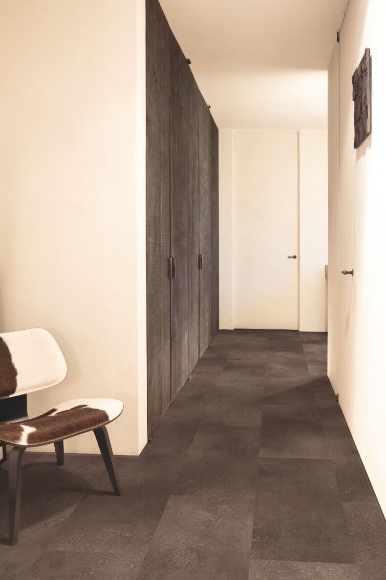 View of Cinnamon Rock AVSTT40233 luxury vinyl tile by Quick-Step Livyn